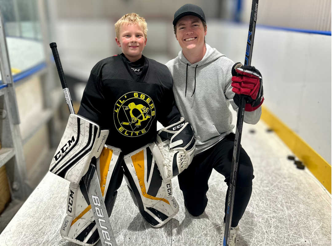 Coach Utah instructor with youth hockey goalies during on-ice training — Parents & Goalies resources page