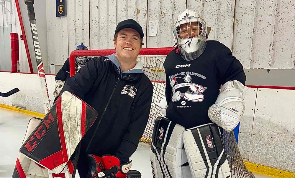 Young hockey players during practice — real-world goalie coaching experience behind Coach Utah